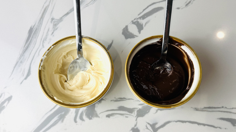 Melted white and semisweet chocolate in ramekins