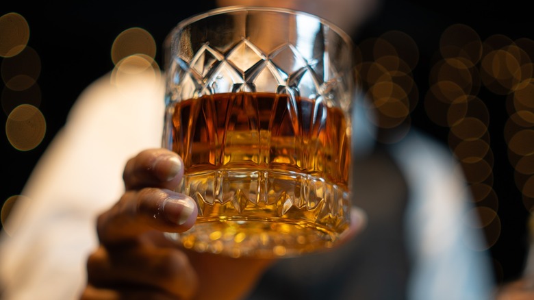 Bartender serving rum.