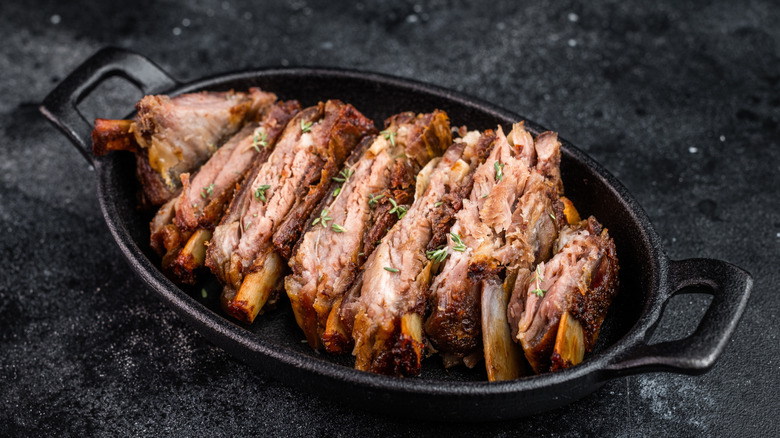 A dish of individual lamb ribs.