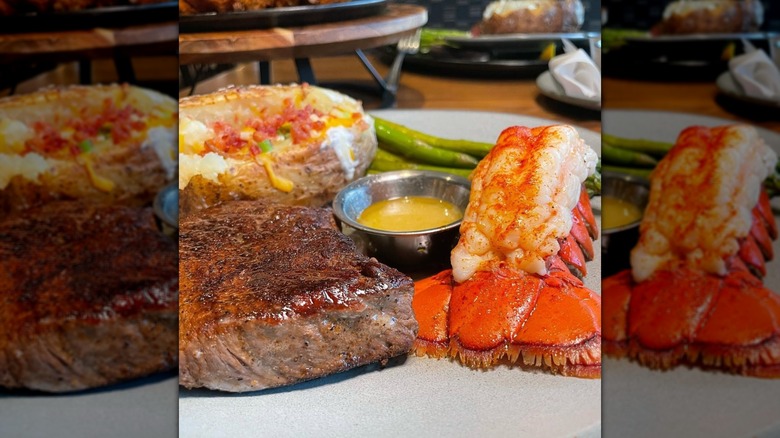 A steak, lobster, and baked potato at Outback Steakhouse