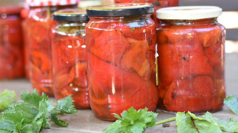 red peppers in jars