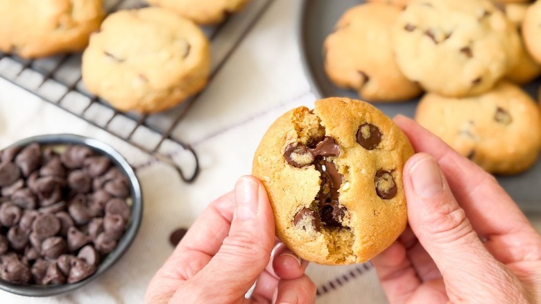 Breaking open a Nutella-stuffed chocolate chip cookie