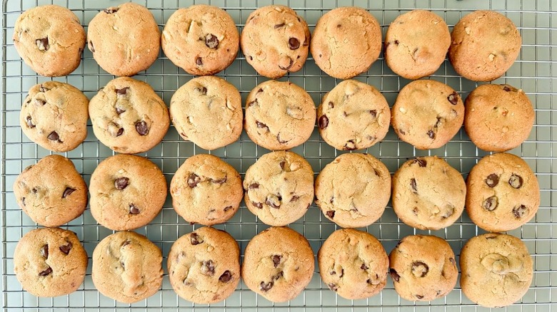 Nutella-stuffed chocolate chip cookies cooling on rack