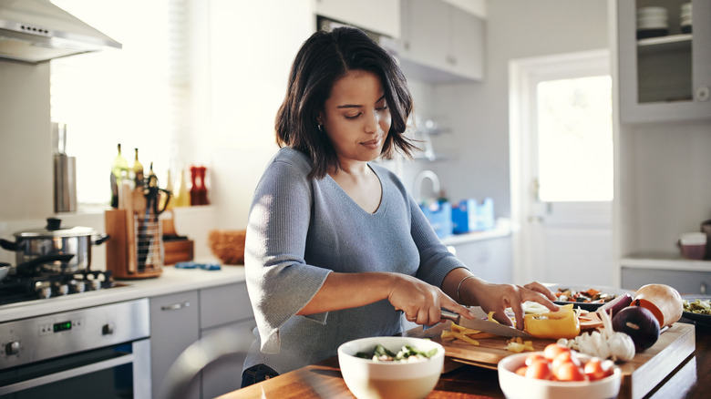 Person cooking in kitchen