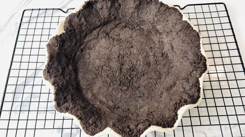 Baked Oreo crumb crust in pie plate