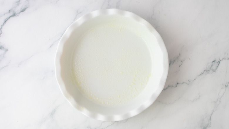 Pie pan coated in cooking spray