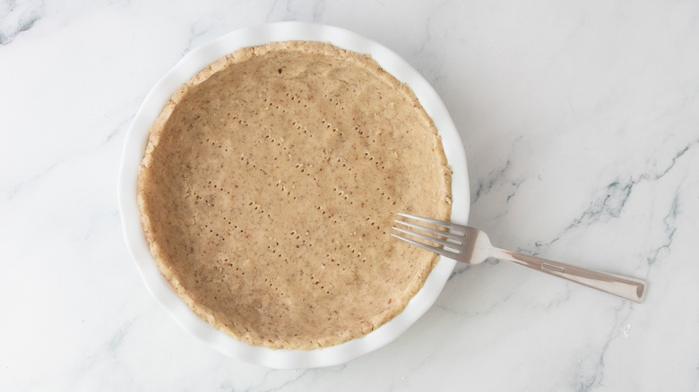 Shortbread crust docked with a fork