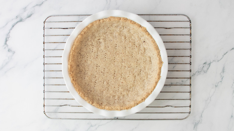 Shortbread crust cooling on a wire rack