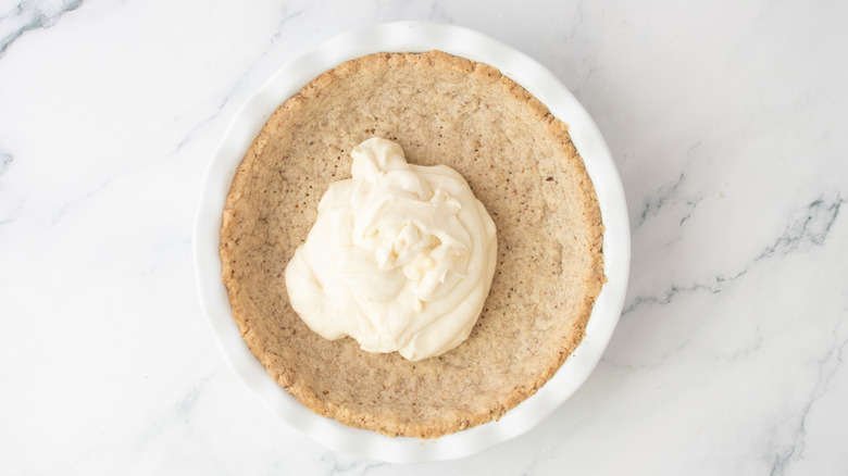 Dollop of creamy pie filling in a shortbread crust