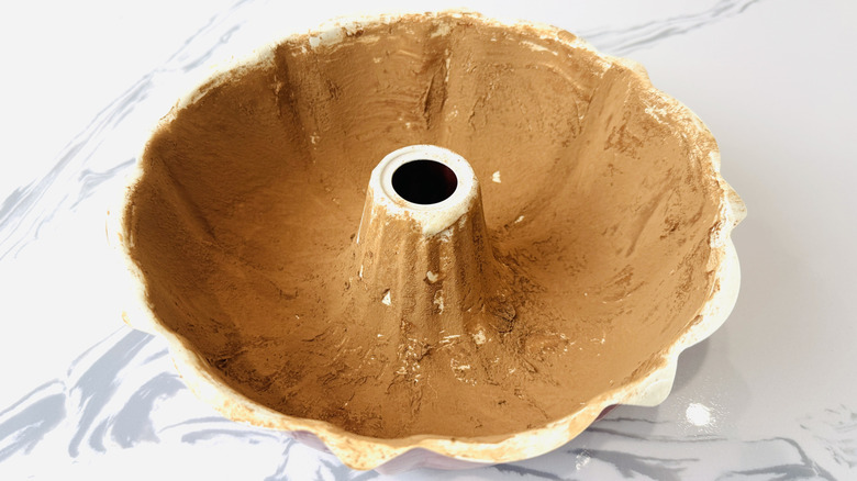 Bundt pan coated with butter and cocoa powder