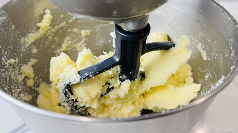 Butter and sugar in a mixing bowl