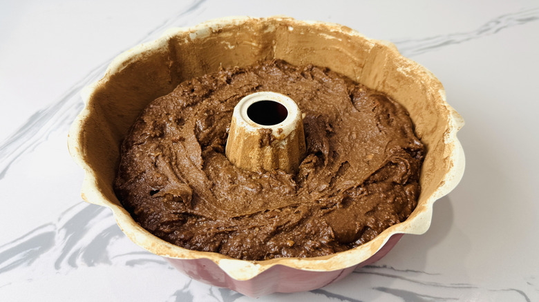 Tunnel of fudge cake batter in bundt pan