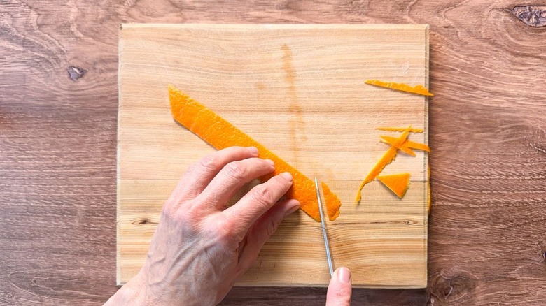 Cutting orange peel into a parallelogram shape