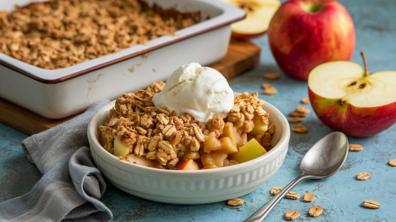 small bowl of apple crisp with ice cream on top