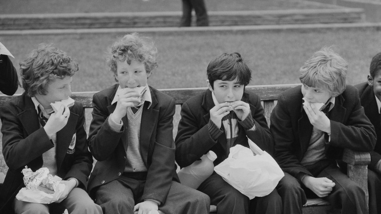 kids eating sandwiches in the 1970s