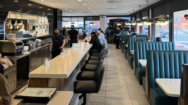 Customers sitting at the counter in Lancers Family Restaurant