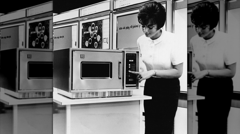 A woman demonstrates how to use a microwave at a kitchen store