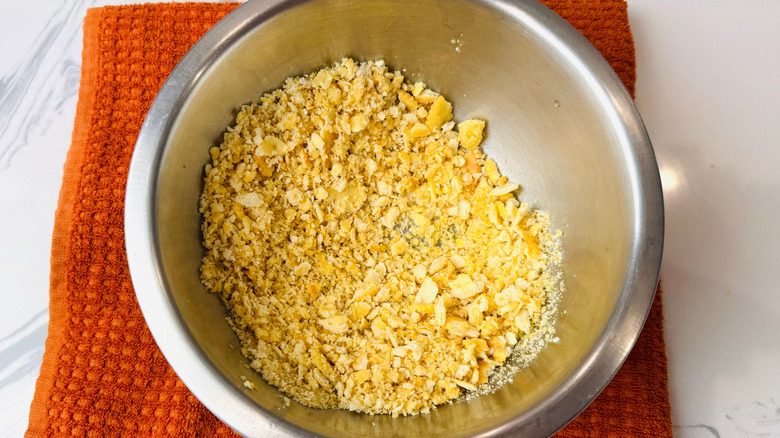 Crushed Ritz crackers in bowl