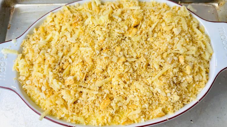 Casserole topped with crushed crackers and cheese