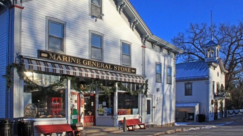 Exterior of Marine General Store with a blue sky and snow