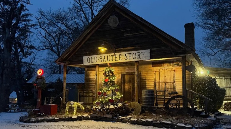 Exterior of Old Sautee Store at night with lights