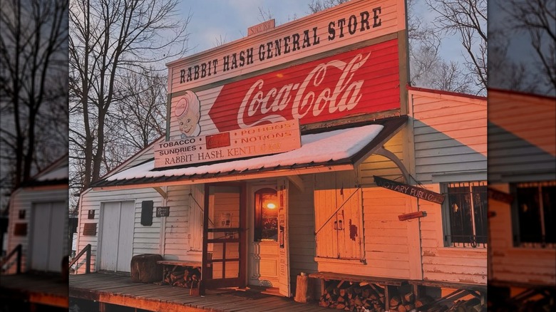 Exterior of the Rabbit Hash General Store with a Coca-Cola sign in the evening