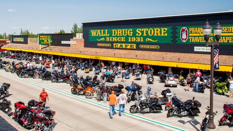 Exterior aerial view of Wall Drug store with lots of people and motorcycles