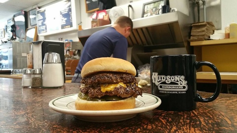 A burger and cup of coffee on a counter at Hudson's Hamburgers in Coeur d'Alene, Idaho