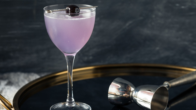 Aviation cocktail on golden tray