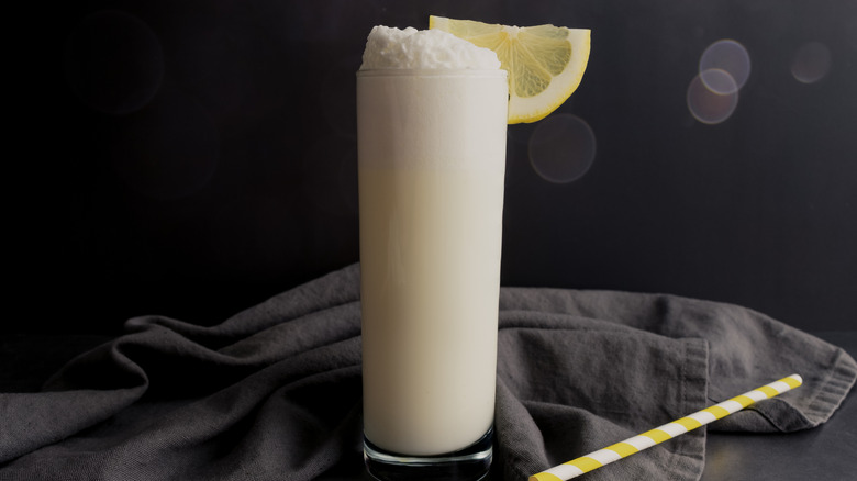 Ramos gin fizz on black background