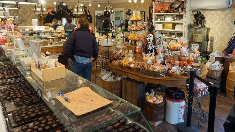 Person shopping at Ye Olde Pepper Candy Companie