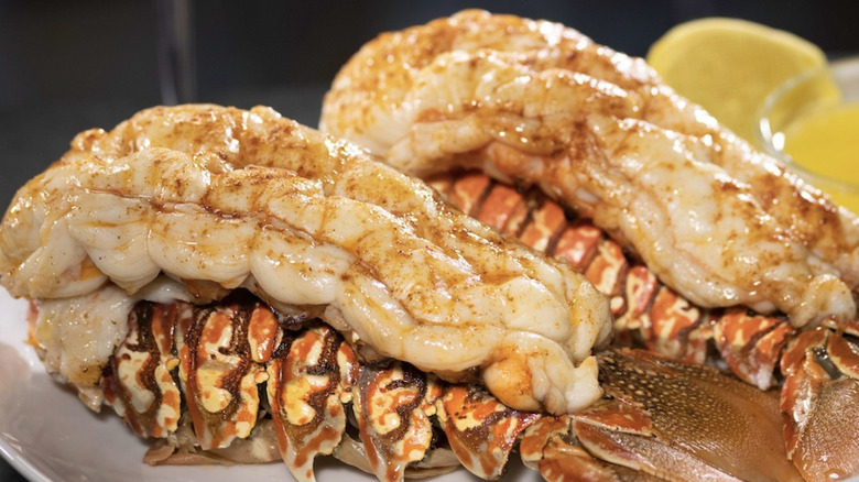Two lobster tails served with lemon and butter at Eddie V's Prime Seafood restaurant