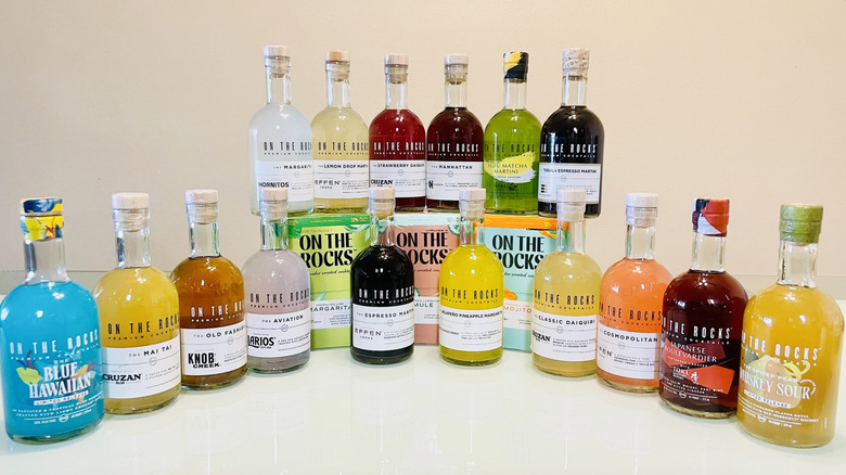 Collection of On The Rocks Cocktails lined up on a table