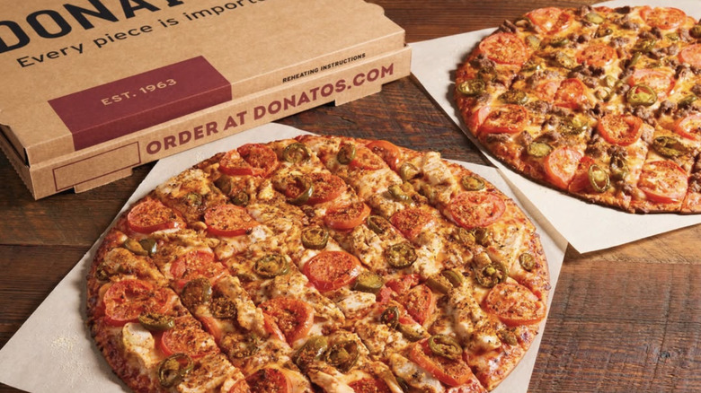 two donatos pizzas with pepperoni and jalapeno