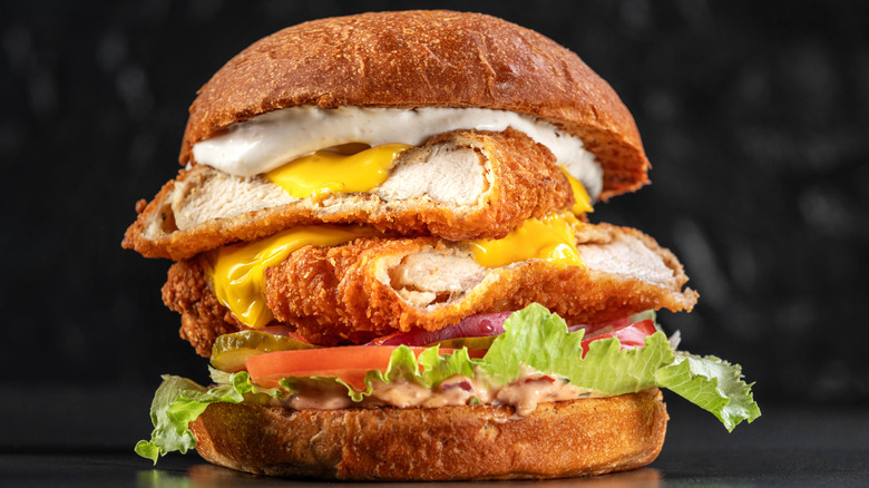 Chicken sandwich on black background