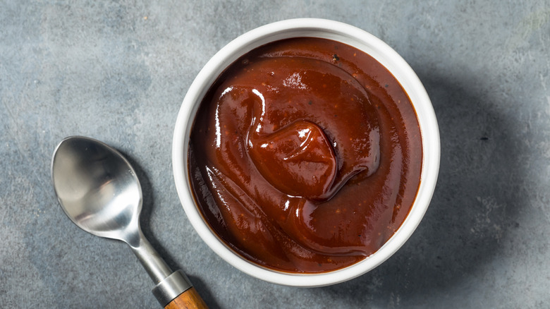 bowl of homemade barbecue sauce with a spoon