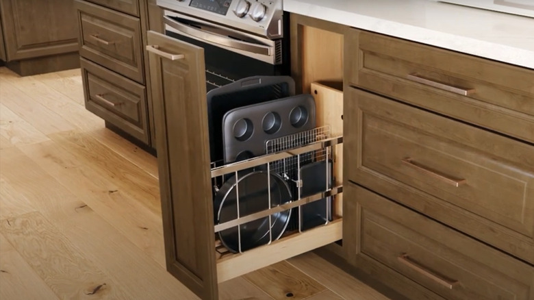 Vertical storage space in a cabinet