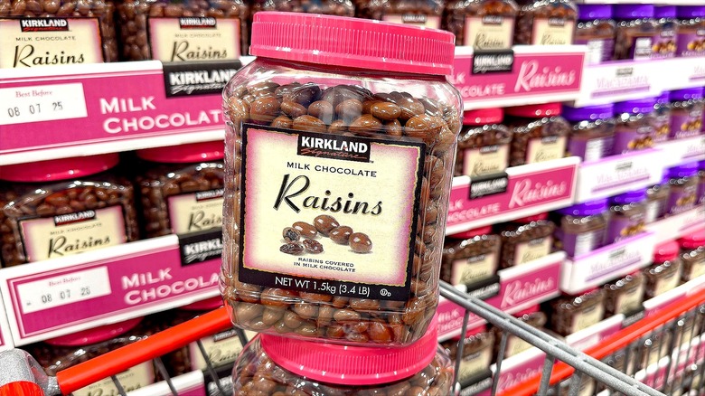 Tub of Costco's Kirkland Signature Milk Chocolate Raisins