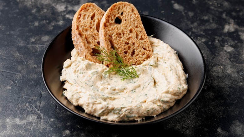 Tuna mousse served with two toasted baguette slices