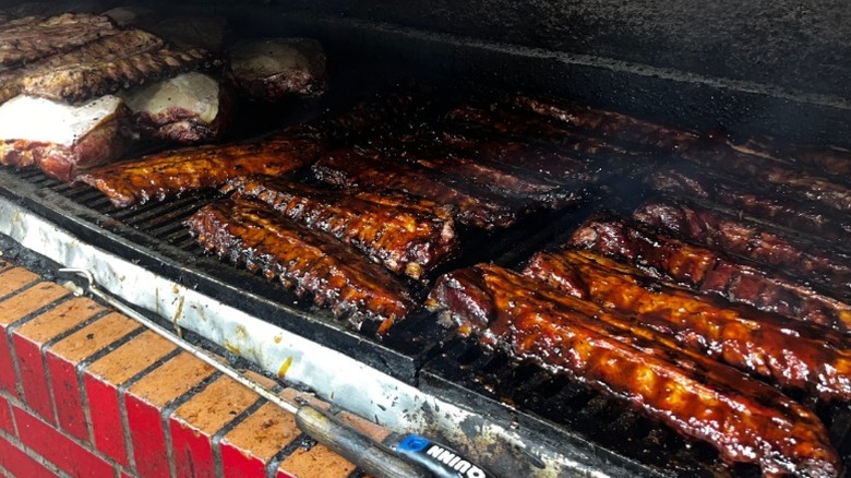 Barbecue ribs on a grill.