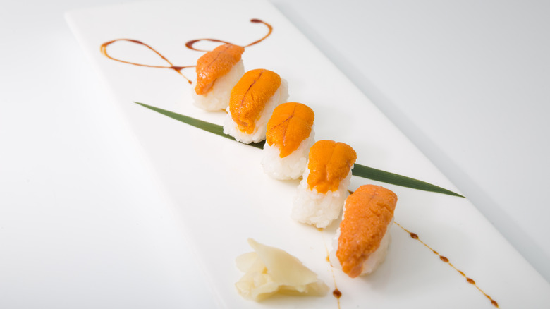 Plate of sea urchin over rice