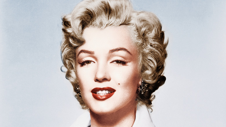 Actress Marilyn Monroe in front of a white background
