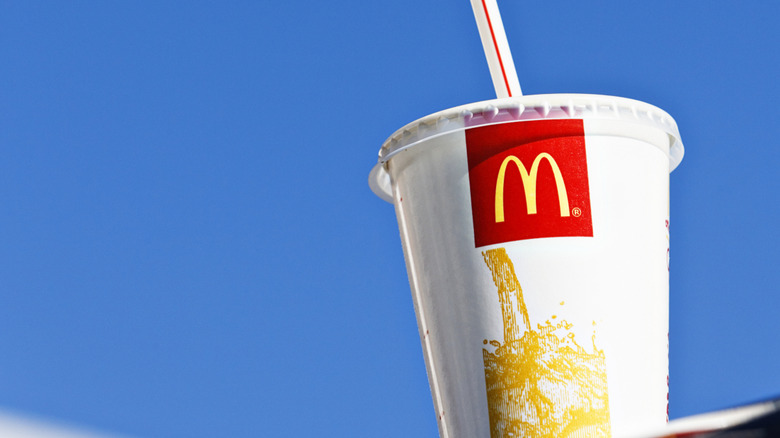 McDonald's drink cup against a blue sky