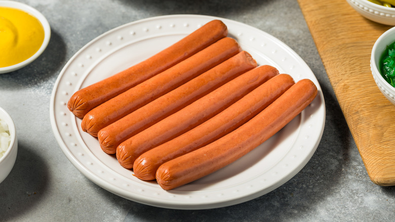 hot dog links displayed on plate