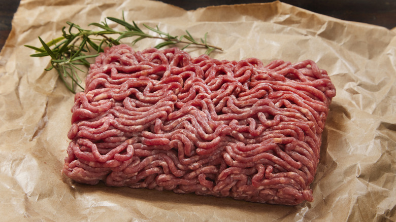 Raw ground beef on butcher paper.