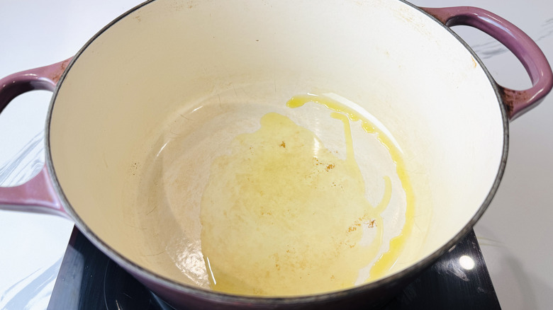 Drizzle of oil in Dutch oven