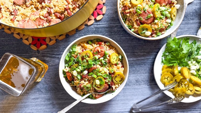 One-pot red beans and rice with garnishes in serving bowls