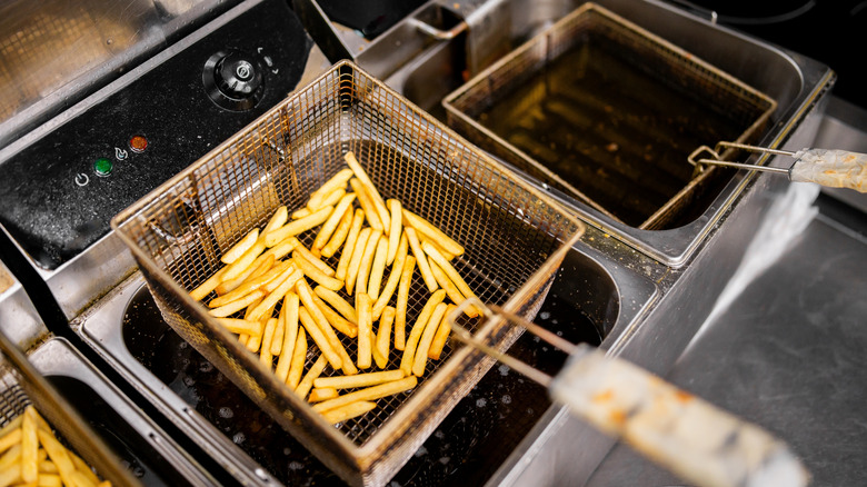 French fries in a restaurant deep fryer