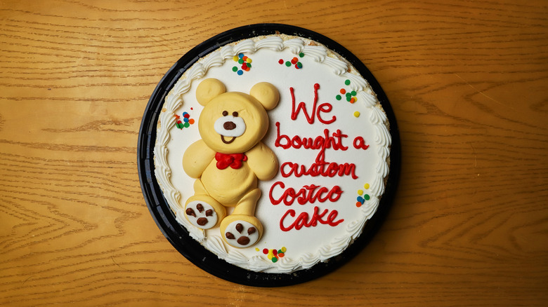 Cake with frosting bear and letter icing