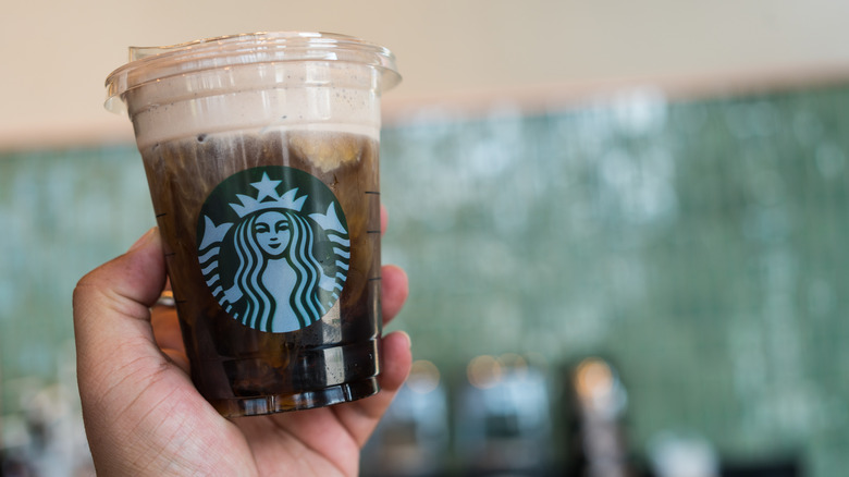 Cup of Starbucks coffee with cold foam.